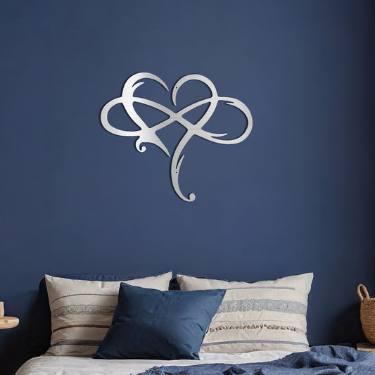 Close up of Heart Infinity Metal Decor piece featuring a heart and infinity symbol, fixed to the wall in a cozy blue bedroom.