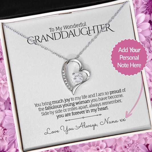 Stunning heart pendant necklace in 14k White Gold finish with a cubic zirconia centerpiece, presented in a gift box with a personalized message card for Granddaughter.