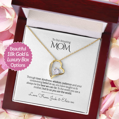 Stunning heart pendant necklace in 18k White Gold finish with a cubic zirconia centerpiece, presented in a luxury mahogony-style gift box with a personalized message card for Mom.