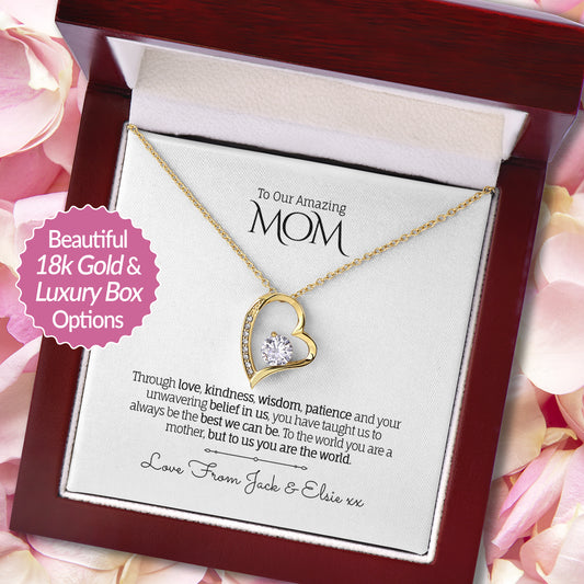 Stunning heart pendant necklace in 18k White Gold finish with a cubic zirconia centerpiece, presented in a luxury mahogony-style gift box with a personalized message card for Mom.
