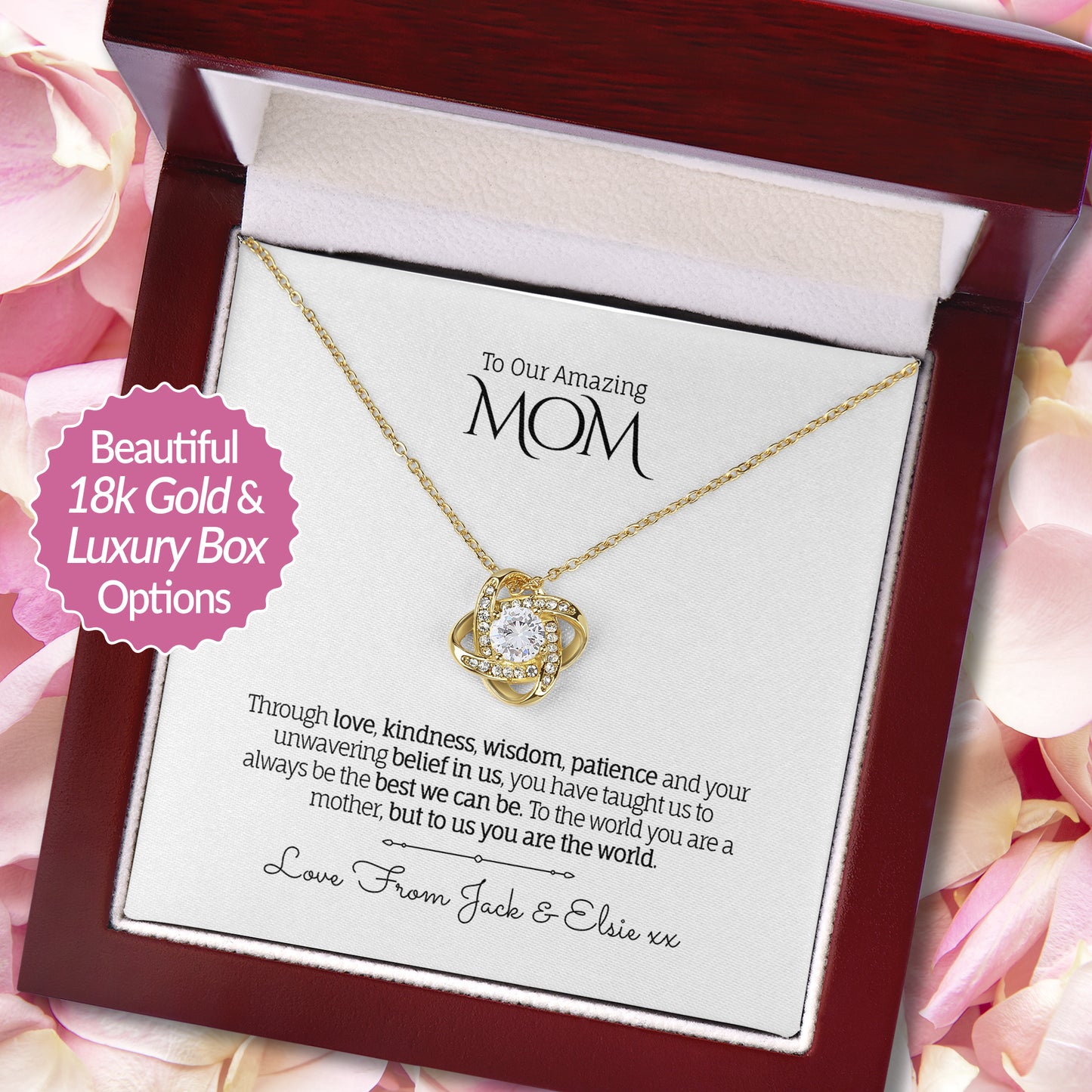 Beautiful Love Knot necklace in 18k Gold finish with a round-cut cubic zirconia in the center, presented in a luxury mahogany-style gift box with a personalized message card to Mom, on a background of soft pink rose petals.