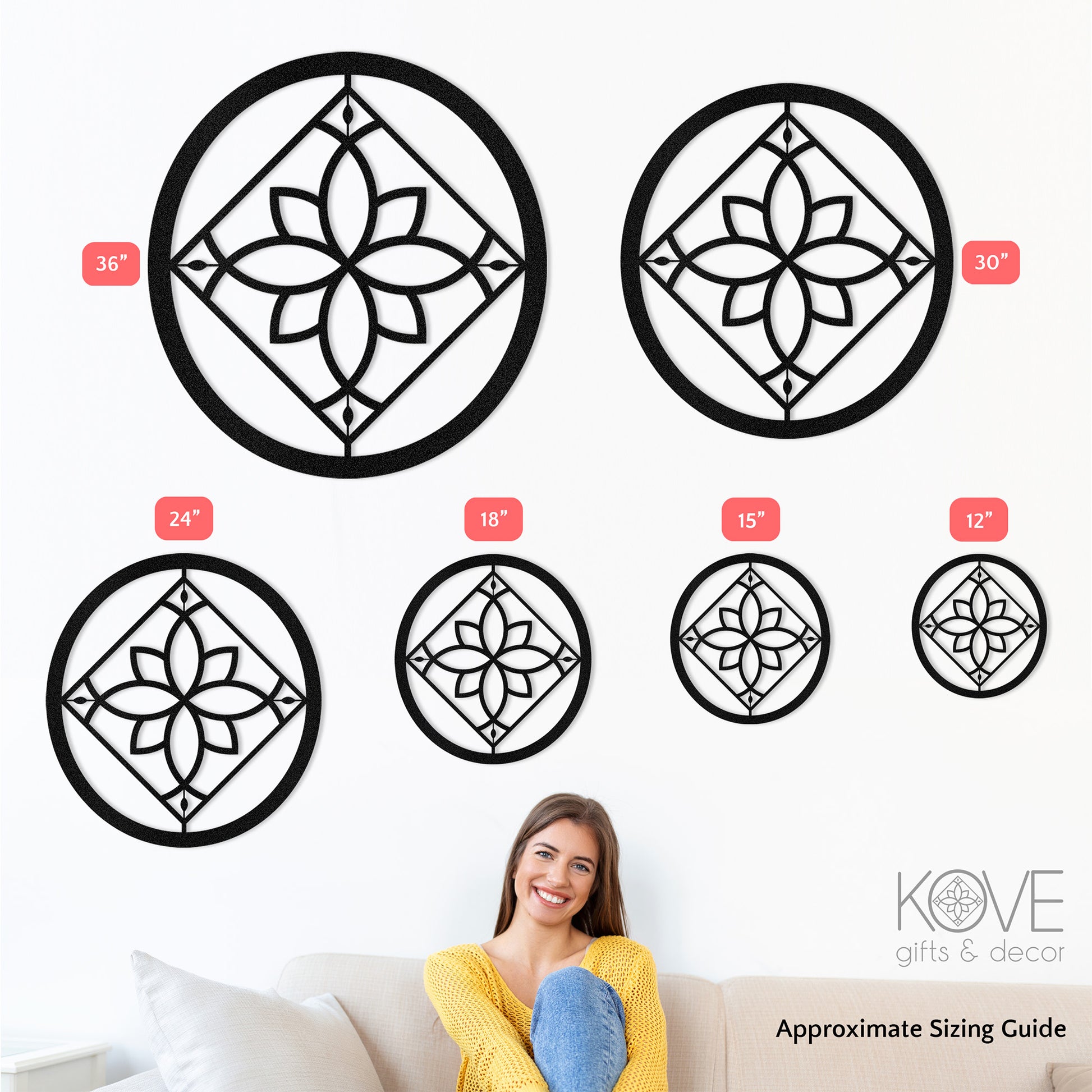 A women sits on a couch with sample metal decor pieces on the wall behind her showing the various sizes available.