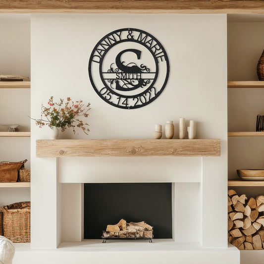 Black Fanciful Monogram Personalized Metal Decor mounted above a modern fireplace.