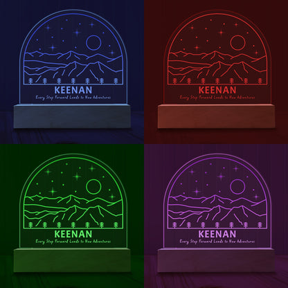 Four images of the New Adventures Personalized Night Light showing examples of four LED light colours - Blue, Red, Green and Purple.