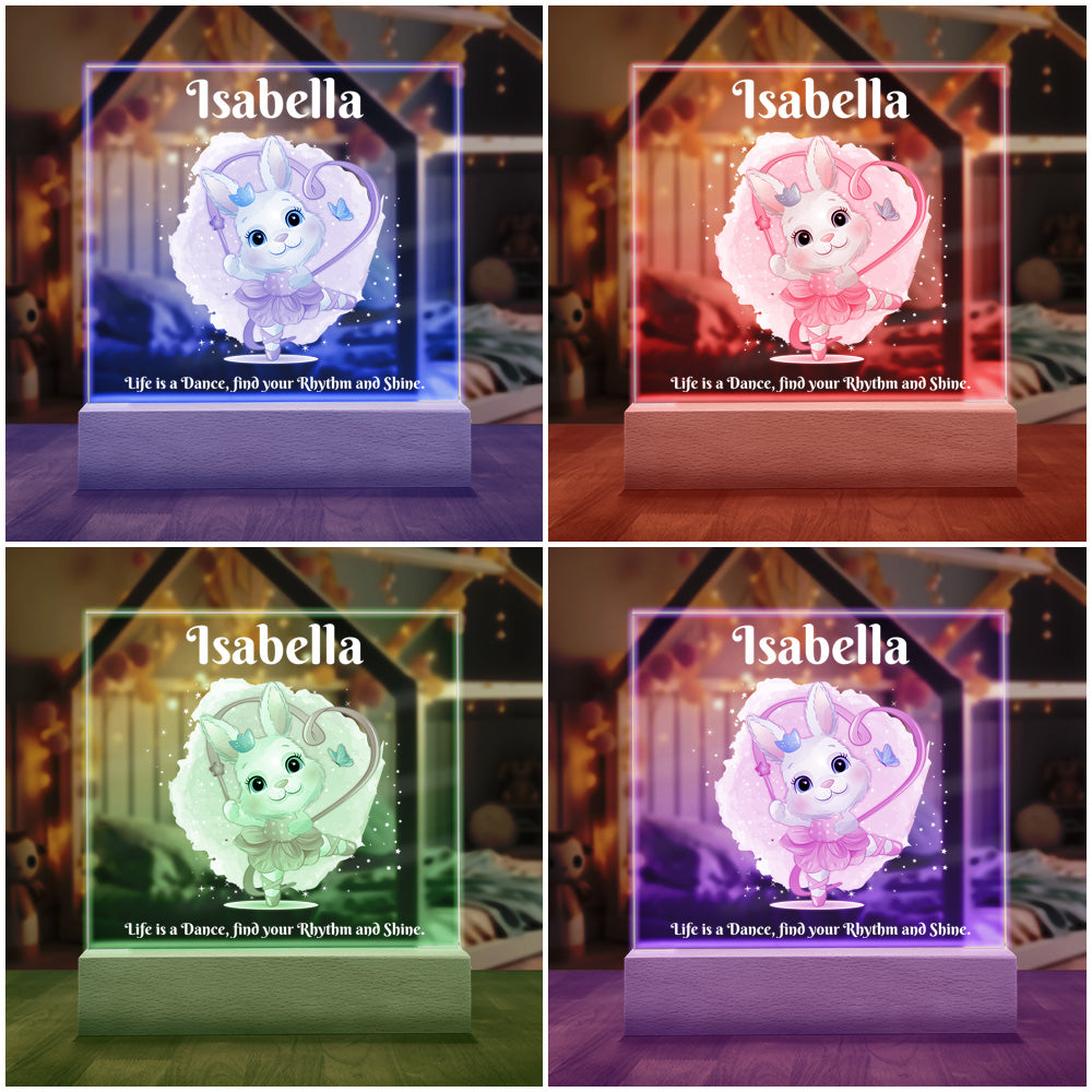 Dancing Bunny Personalized Night Light shown with four of the seven available colored LED lights on in Blue, Red, Purple and Green.