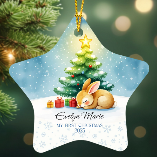Star-shaped Personalized Christmas ornament with a sweet little bunny sleeping next to a christmas tree.
