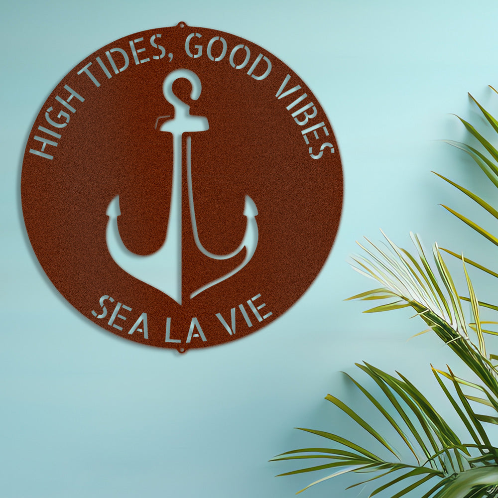 Bold Anchor Plaque Personalize Metal Decor customized with fun nautical phrases and displayed in Copper on a soft blue colored wall in a modern home.