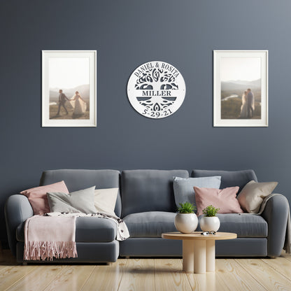 White Elaborate Tree Of Life with Family Name Metal Sign fitted to blue wall in modern living area