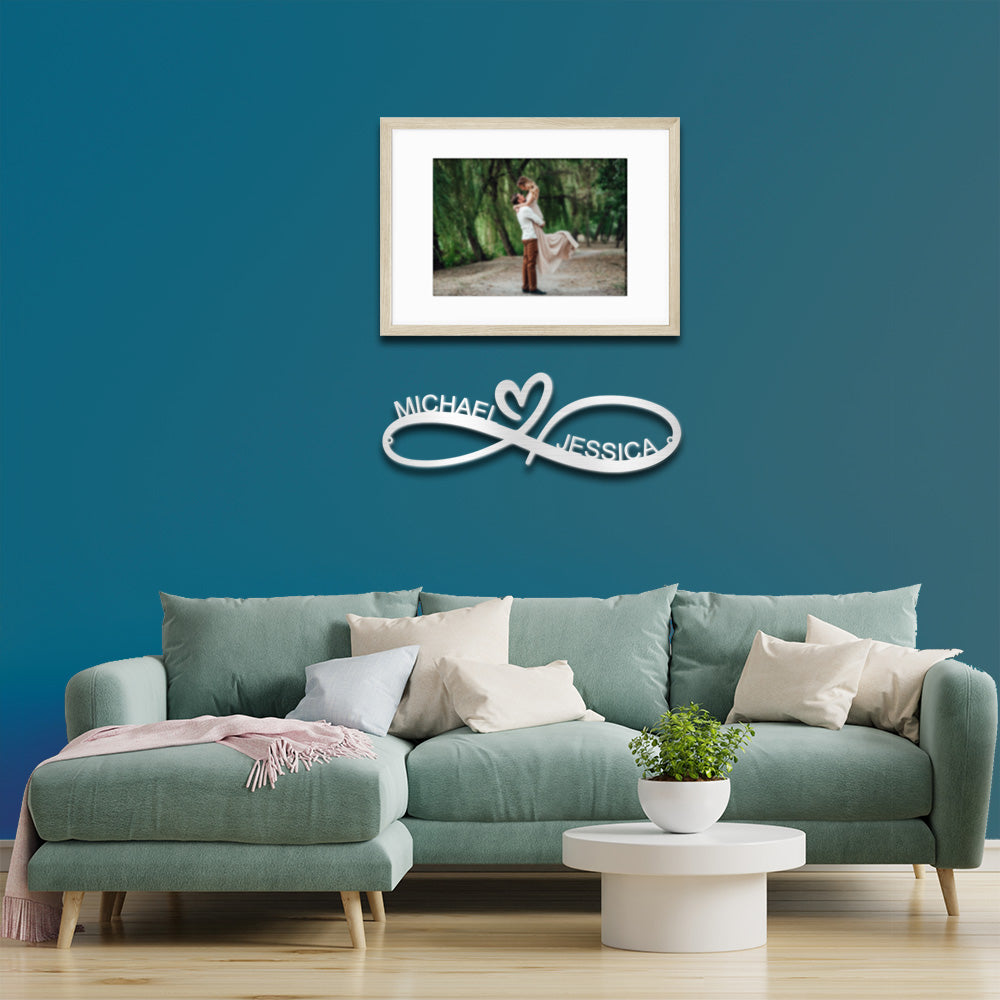 Silver Infinity Heart Couple Personalized Metal Decor featured below a wedding photo in a modern lounge