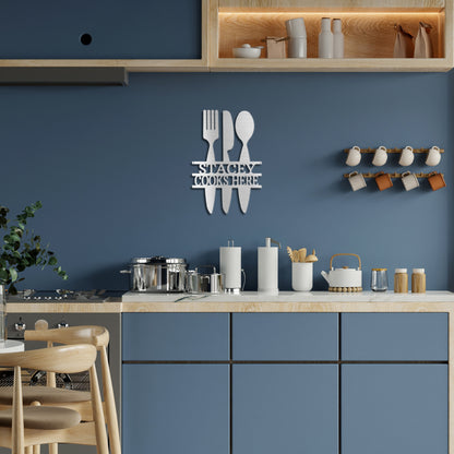 Silver Kitchen Utensil Personalized Metal Decor featured the wall of a modern blue kitchen