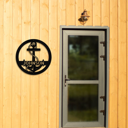 Black Simplicity Anchor Ring Personalized Metal Decor featured next to the front door of a timber home